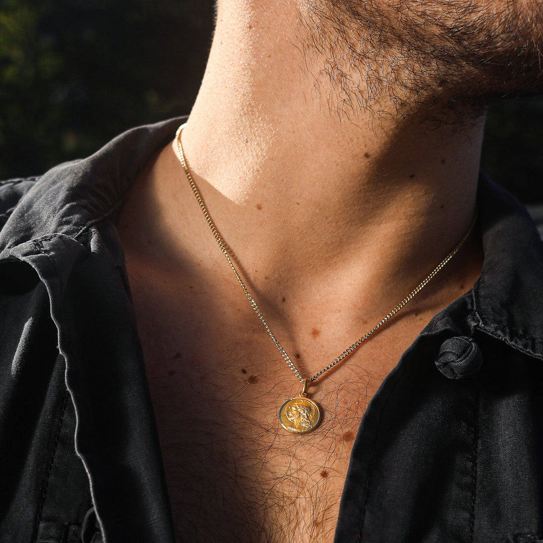 ICONIC YELLOW GOLD CHRIST PENDANT