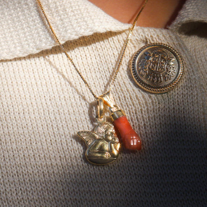 CURALLU FIST PENDANT